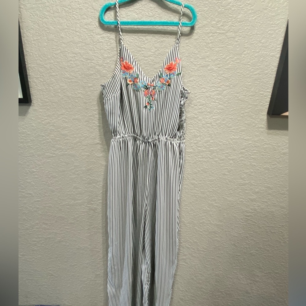 Black and white noodle strap jumpsuit romper